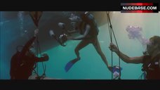 67. Ashley Scott Topless Sunbathing – Into The Blue