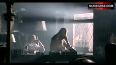 1. Antoinette Valente Sitting Nude on Table – Red Letters