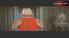 34. Marilyn Monroe in Sexy Red Body Suit – How To Marry A Millionaire