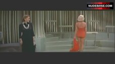 89. Marilyn Monroe in Sexy Red Body Suit – How To Marry A Millionaire