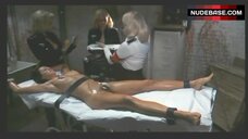 34. Maria Marx Nude Lying on Table – Ilsa, She Wolf Of The S.S.