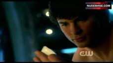 100. Erica Durance Tattoo on Boobs – Smallville