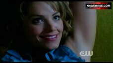 45. Erica Durance Tattoo on Boobs – Smallville