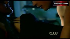 56. Erica Durance Tattoo on Boobs – Smallville