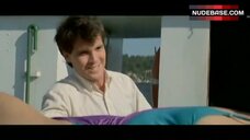 45. Deborah Goodrich in One-Piece Violet Swimsuit – April Fool'S Day