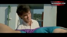 56. Deborah Goodrich in One-Piece Violet Swimsuit – April Fool'S Day