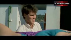 67. Deborah Goodrich in One-Piece Violet Swimsuit – April Fool'S Day