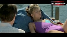 89. Deborah Goodrich in One-Piece Violet Swimsuit – April Fool'S Day