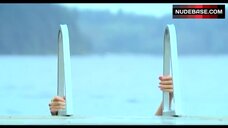 1. Erica Durance Got Unconscious on Beach – Smallville