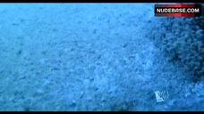 23. Erica Durance Got Unconscious on Beach – Smallville