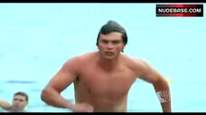 89. Erica Durance Got Unconscious on Beach – Smallville