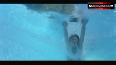 1. Meredith Salenger Swimming in Pool – The Kiss