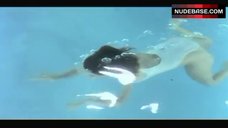3. Meredith Salenger Swimming in Pool – The Kiss