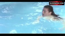 4. Meredith Salenger Swimming in Pool – The Kiss
