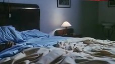 1. Monica Bellucci Topless in Bed – Vita Coi Figli