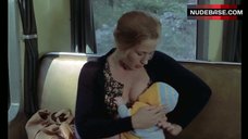5. Brigitte Fossey Breast Feeding – Going Places