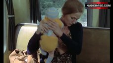 8. Brigitte Fossey Breast Feeding – Going Places