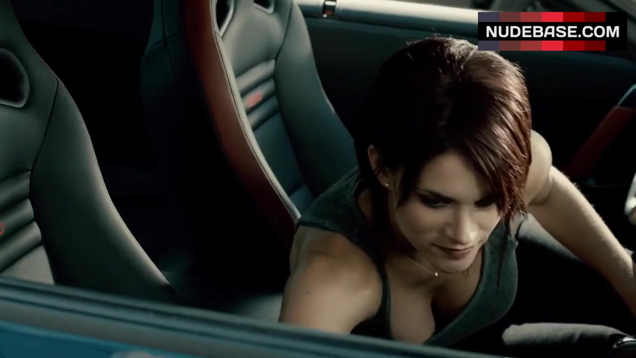 9. Missy Peregrym Sexy in Car - Cybergeddon.